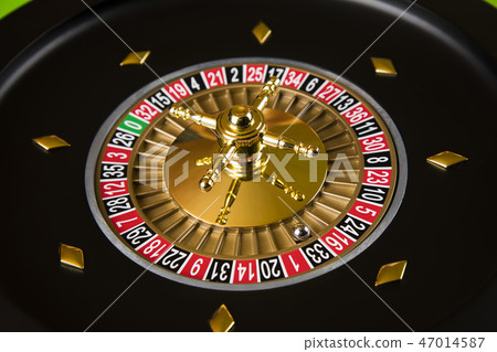 Roulette wheel running in a casino 47014587