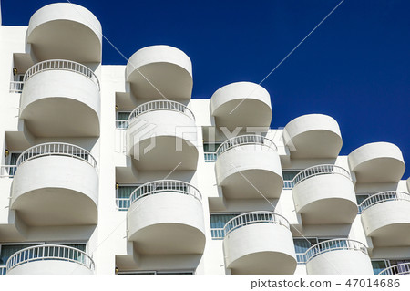 Balconies of a modern building . blue sky background Balconies of a modern building . blue sky background 47014686