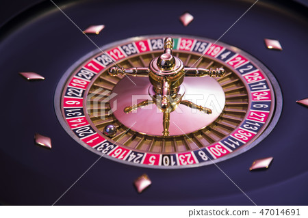 Roulette wheel running in a casino Roulette wheel running in a casino 47014691