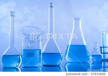 Laboratory beakers,Science experiment, blue Laboratory beakers,Science experiment, blue 47014698