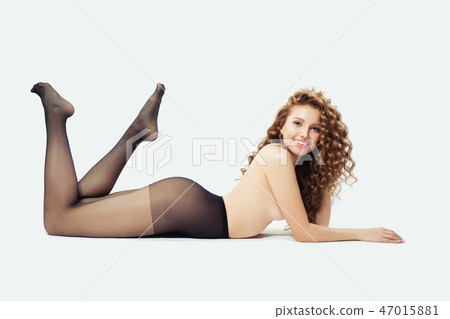 Sexy blonde woman fashion model lying Sexy blonde woman fashion model lying 47015881