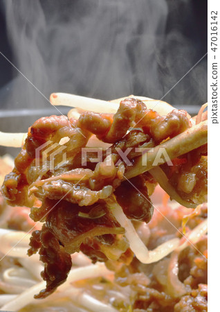 Cooking scene of grilled meat 47016142