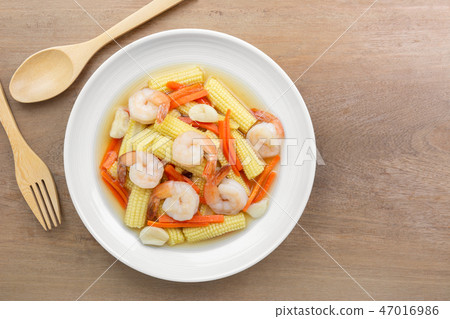 stir fried shrimp with baby corn and carrot stir fried shrimp with baby corn and carrot 47016986
