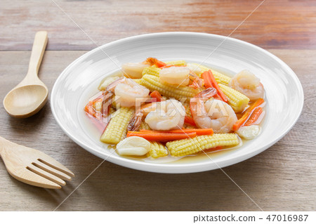 stir fried shrimp with baby corn and carrot stir fried shrimp with baby corn and carrot 47016987