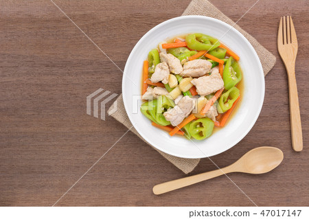 top view of stir fried pork with banana pepper top view of stir fried pork with banana pepper 47017147