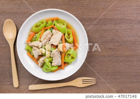 top view of stir fried pork with banana pepper top view of stir fried pork with banana pepper 47017148