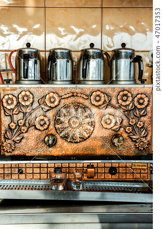 A kitchen landscape with relief decorations lined with pots 47017353