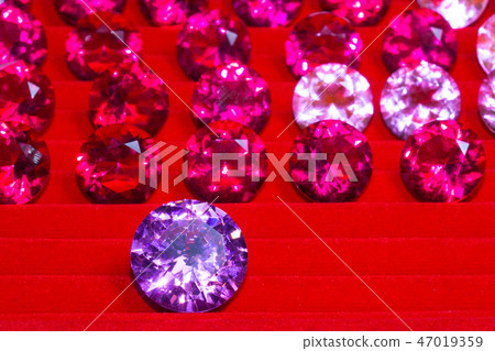 amethyst diamond on red background 47019359