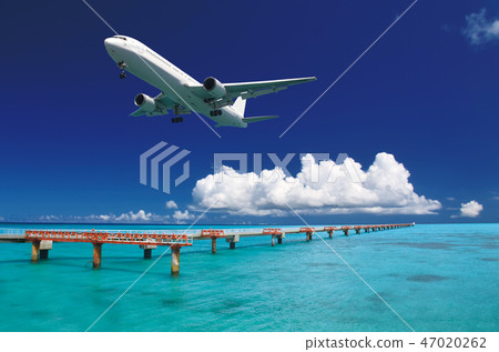 Landing plane and blue sea-Shikishima Airport RW17 end 47020262