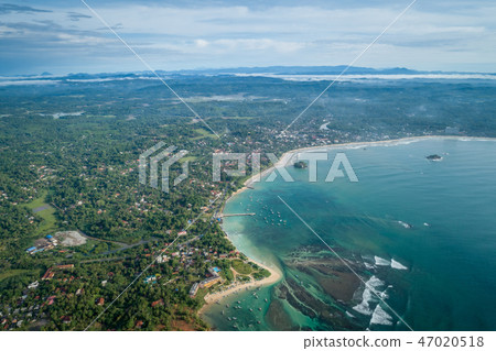 aerial view of coastline and fisherman village aerial view of coastline and fisherman village 47020518