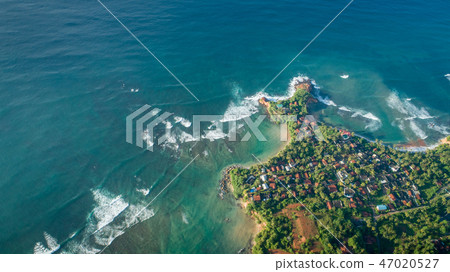 aerial view of coastline and fisherman village aerial view of coastline and fisherman village 47020527