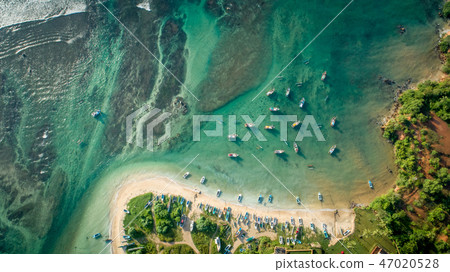 aerial view of coastline and fisherman village aerial view of coastline and fisherman village 47020528
