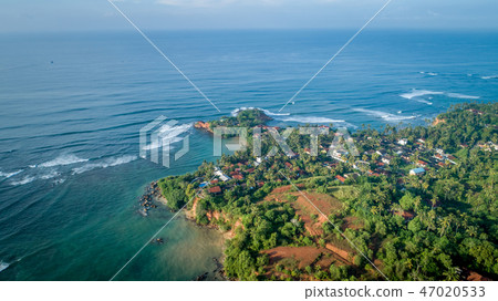 aerial view of coastline and fisherman village aerial view of coastline and fisherman village 47020533