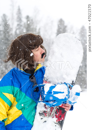 Vintage photo of young man snowboarder Vintage photo of young man snowboarder 47021570