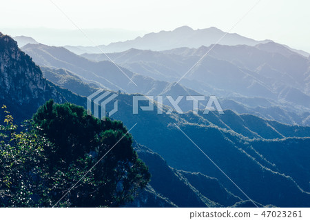 beautiful foggy mountain landscape in china beautiful foggy mountain landscape in china 47023261