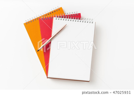 Top view of 3 spiral notebook, page, pencil 47025931