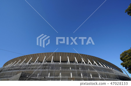 Tokyo cityscape in Japan New National Stadium under construction with blue sky = January 1, 2019 Tokyo cityscape in Japan New National Stadium under construction with blue sky = January 1, 2019 47028133