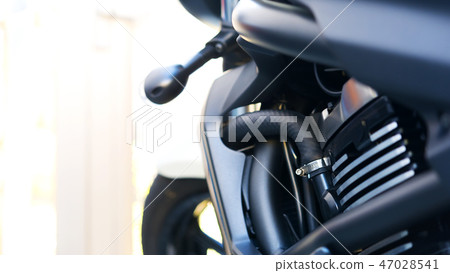 Motorcycle Sunset Bicycle close-up photo Motorcycle Sunset Bicycle close-up photo 47028541