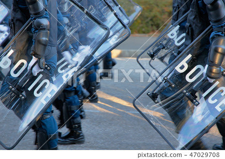 Police riot police protecting the city Police riot police protecting the city 47029708