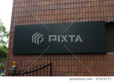 Large blank billboard on a street wall Large blank billboard on a street wall 47029771