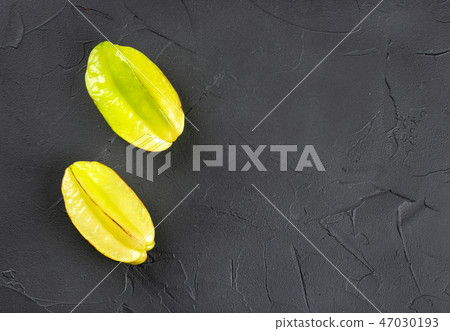 Two carambola fruits 47030193