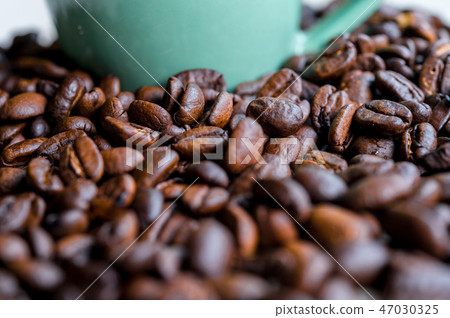 Coffee. Coffee beans. Coffee cup full  47030325