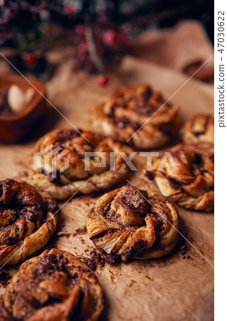 Cinnabon with chocolate as cake food concept. Close up view 47030622