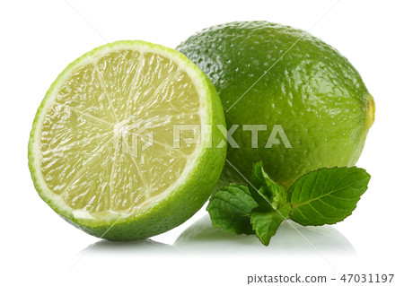 Whole and slice of lime with mint leaves Whole and slice of lime with mint leaves 47031197