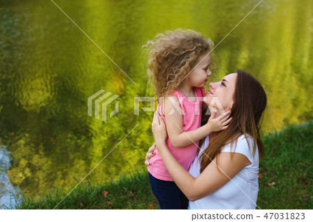 Family picnic. Mother and daughter 47031823
