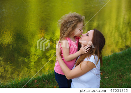 Family picnic. Mother and daughter 47031825