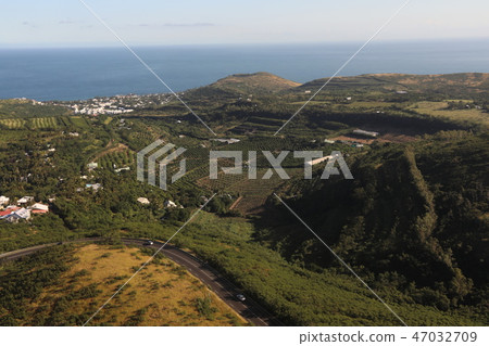 Top view of the sea and the village of which is between them 47032709