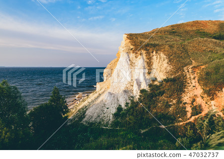Landscape of a cliff next to the river Landscape of a cliff next to the river 47032737