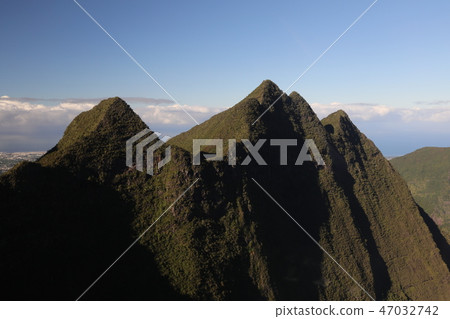 Top view of the mountains and the sky which is behind them Top view of the mountains and the sky which is behind them 47032742