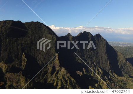 Top view of the mountains and the sky which is behind them 47032744