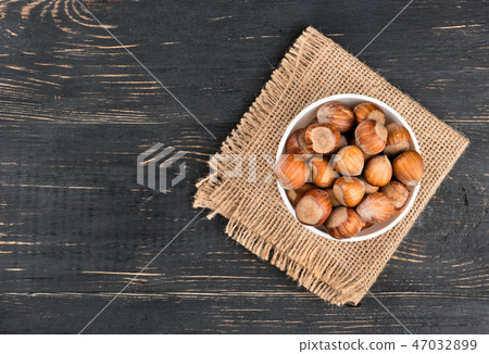 Hazelnuts in bowl Hazelnuts in bowl 47032899