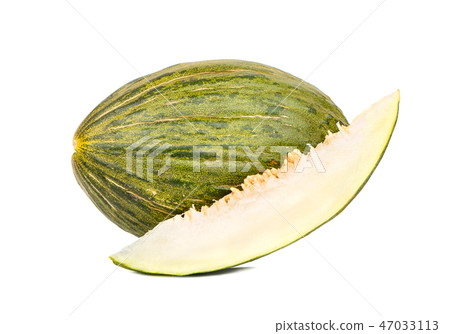Green melon with slice 47033113
