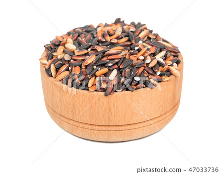 Black rice in a bowl 47033736
