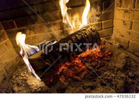log is burning in fireplace log is burning in fireplace 47036132