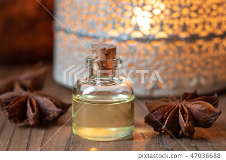 A bottle of star anise essential oil  47036688