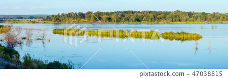 Evening summer lake landscape. Evening summer lake landscape. 47038815