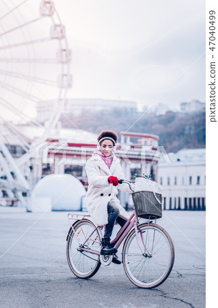 Kind curly haired african woman posing on camera 47040499