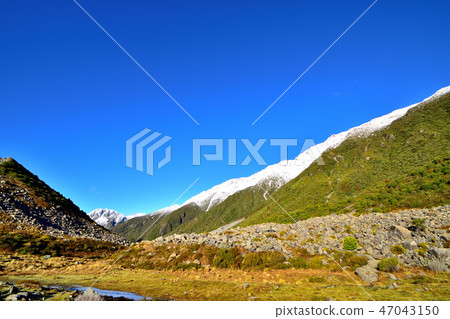 Alps Mt. Cook and National Park in the Southern Hemisphere at Sunrise 47043150