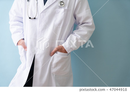 Doctor wearing white coat 47044918
