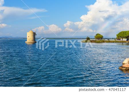Old Spanish windmill in lagoon Orbetello 47045117