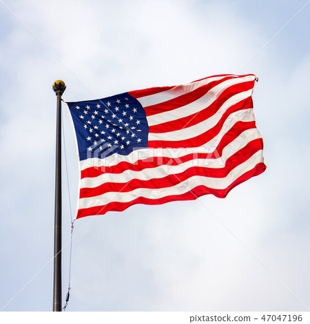 The United States of America flag on a sunny day. The United States of America flag on a sunny day. 47047196