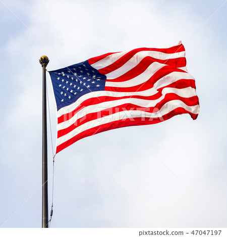 The United States of America flag on a sunny day. 47047197