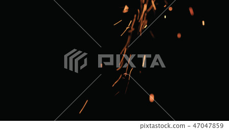 hot sparks falling from above black background 47047859
