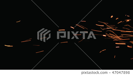 hot sparks floating from side on black background hot sparks floating from side on black background 47047898
