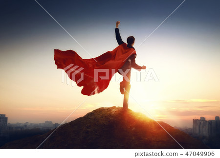 superhero businessman looking at city superhero businessman looking at city 47049906
