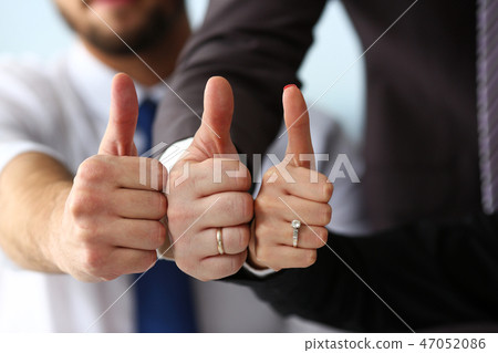 Group of people show OK or confirm with thumb up Group of people show OK or confirm with thumb up 47052086